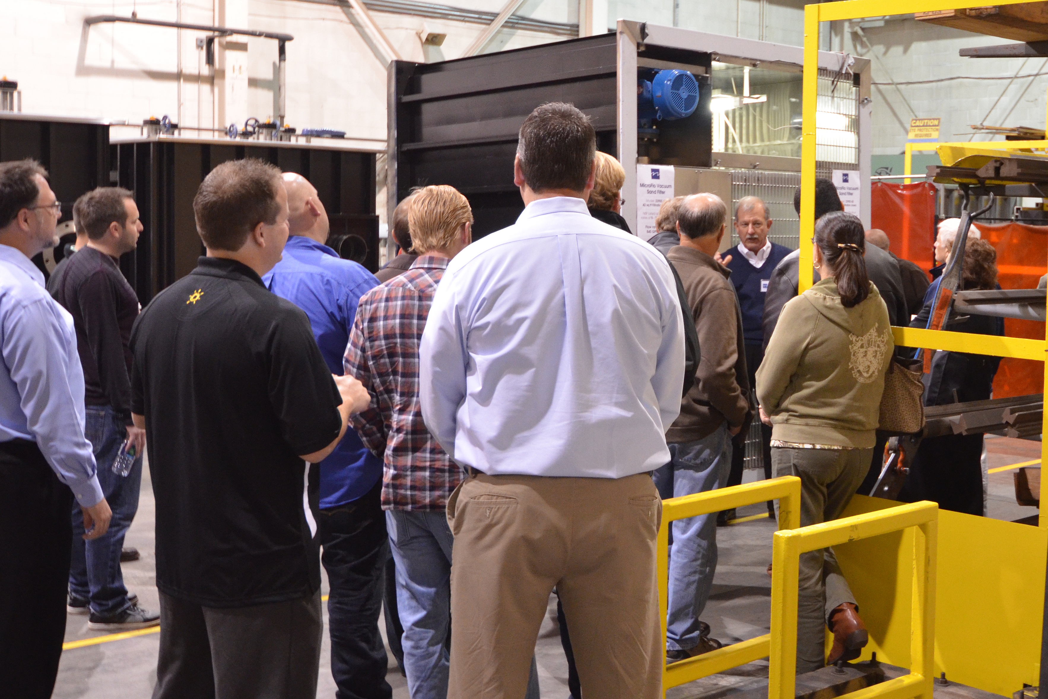 Natare's Michael Walsh giving facility tour to MPG members