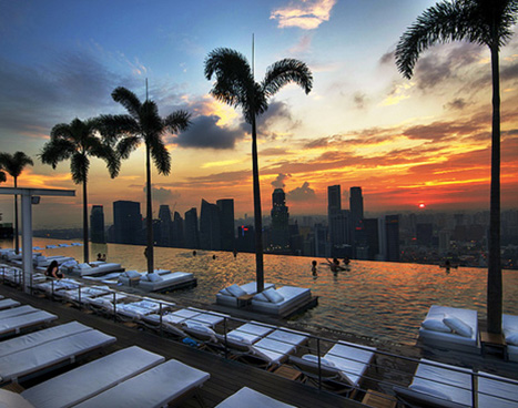 stainless steel infinity pool at sunset