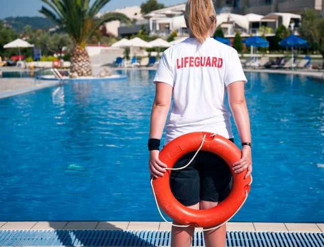 lifeguard with life preserver